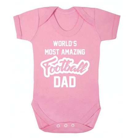 Worlds most amazing football dad Baby Vest pale pink 18-24 months