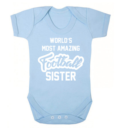 Worlds most amazing football sister Baby Vest pale blue 18-24 months