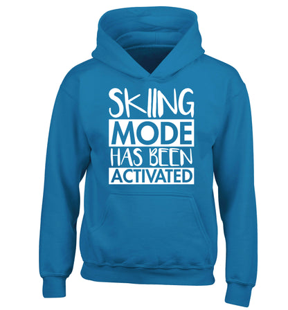Skiing mode activated children's blue hoodie 12-14 Years