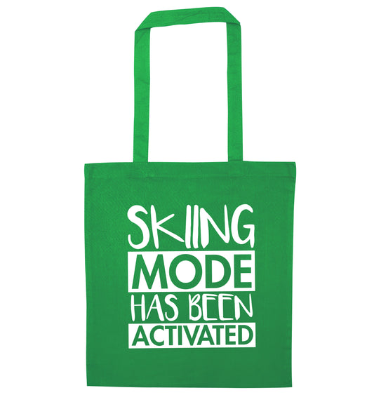 Skiing mode activated green tote bag