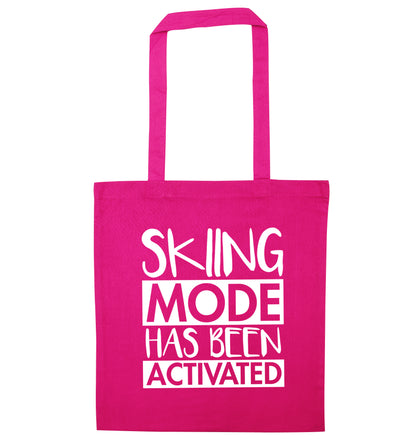 Skiing mode activated pink tote bag