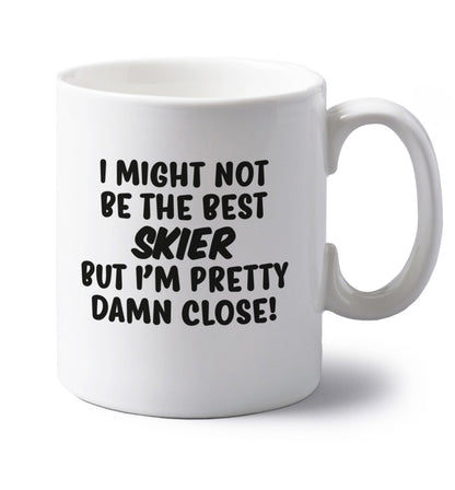 I might not be the best skier but I'm pretty damn close! left handed white ceramic mug 