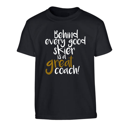 Behind every good skier is a great coach! Children's black Tshirt 12-14 Years