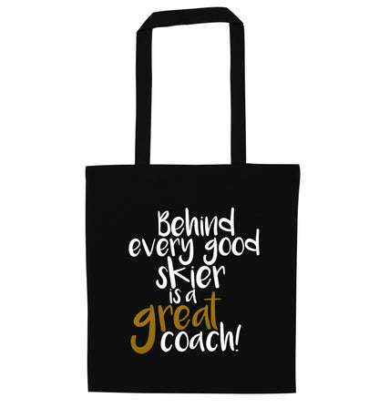 Behind every good skier is a great coach! black tote bag
