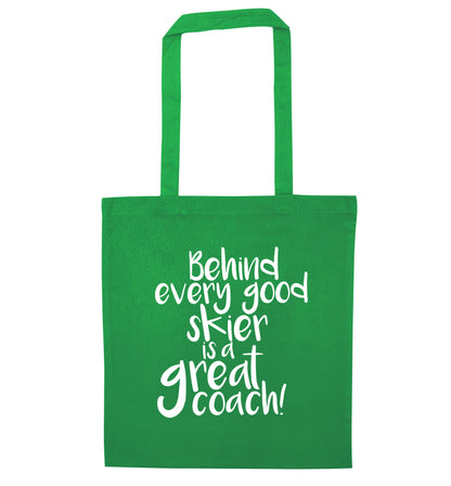 Behind every good skier is a great coach! green tote bag