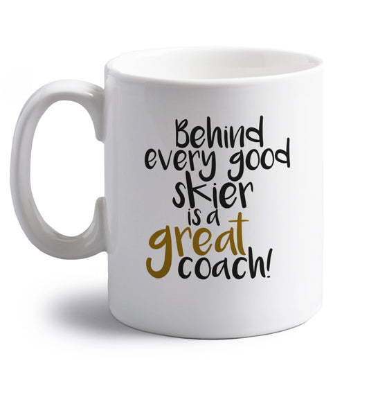 Behind every good skier is a great coach! right handed white ceramic mug 
