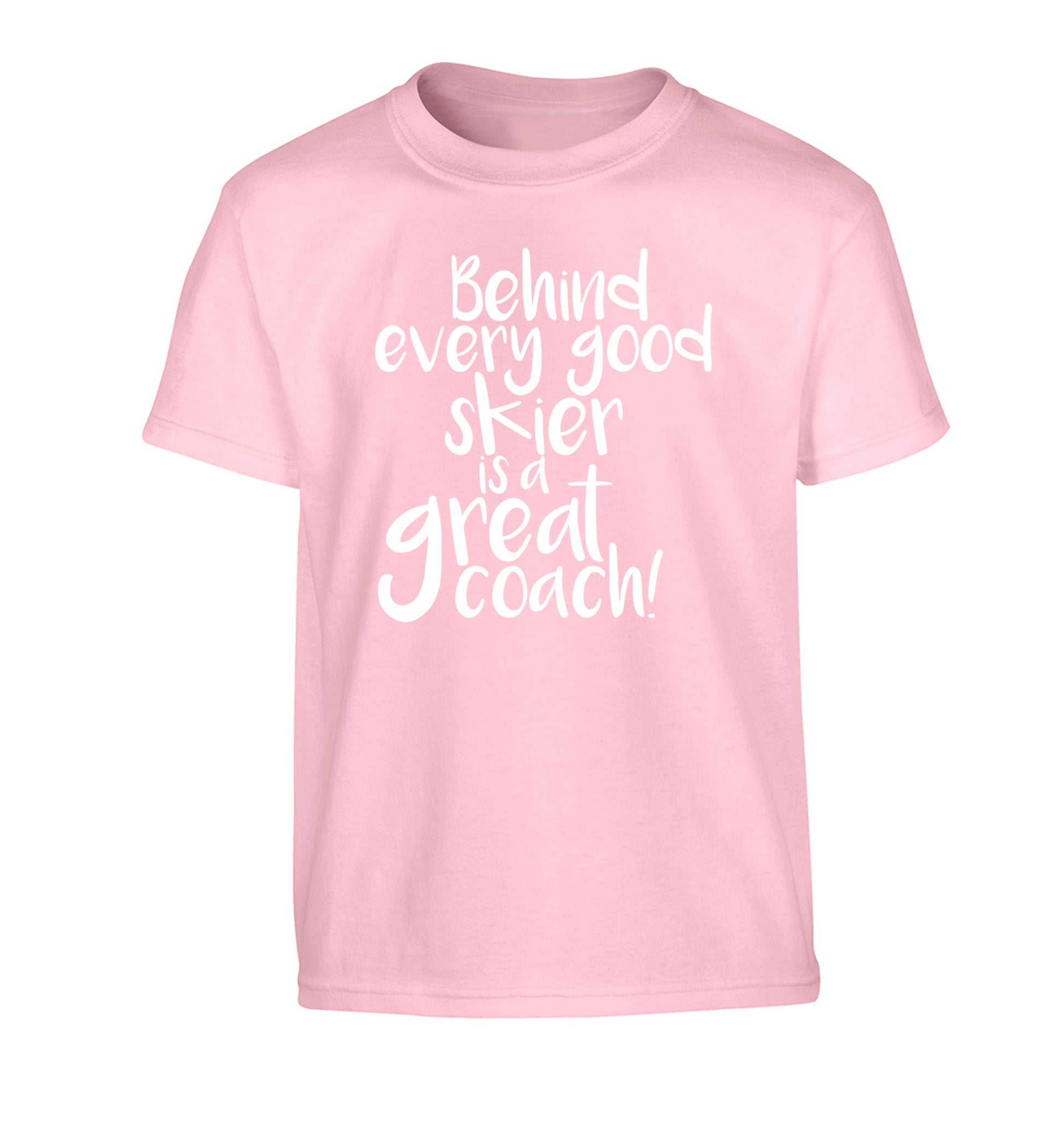 Behind every good skier is a great coach! Children's light pink Tshirt 12-14 Years