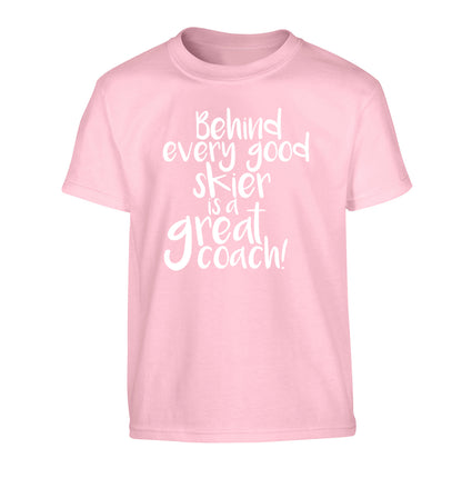 Behind every good skier is a great coach! Children's light pink Tshirt 12-14 Years