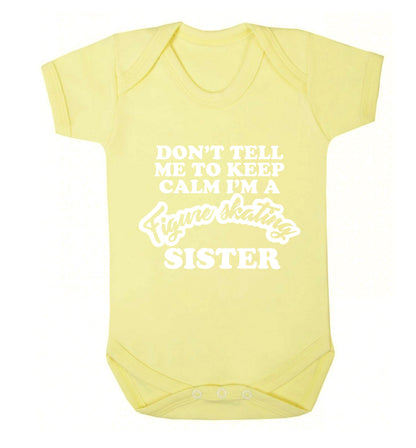 Don't tell me to keep calm I'm a figure skating sister Baby Vest pale yellow 18-24 months