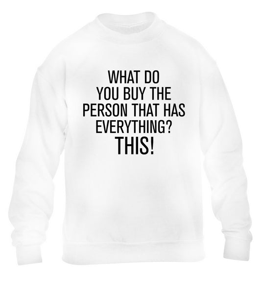 What do you buy the person that has everything? This! children's white sweater 12-13 Years