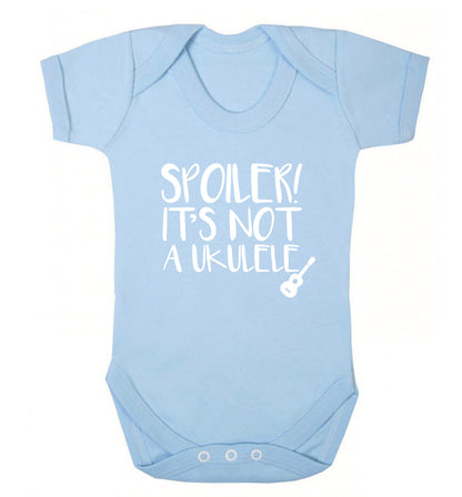 Spoiler it's not a ukulele Baby Vest pale blue 18-24 months