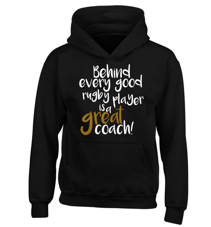 Behind every goor rugby player is a great coach children's black hoodie 12-13 Years