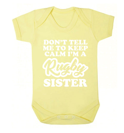 Don't tell me keep calm I'm a rugby sister Baby Vest pale yellow 18-24 months