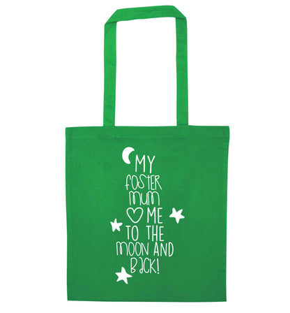 My foster mum loves me to the moon and back green tote bag