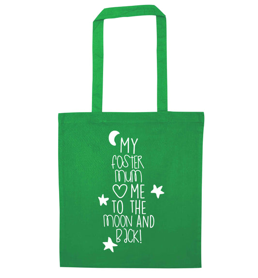 My foster mum loves me to the moon and back green tote bag