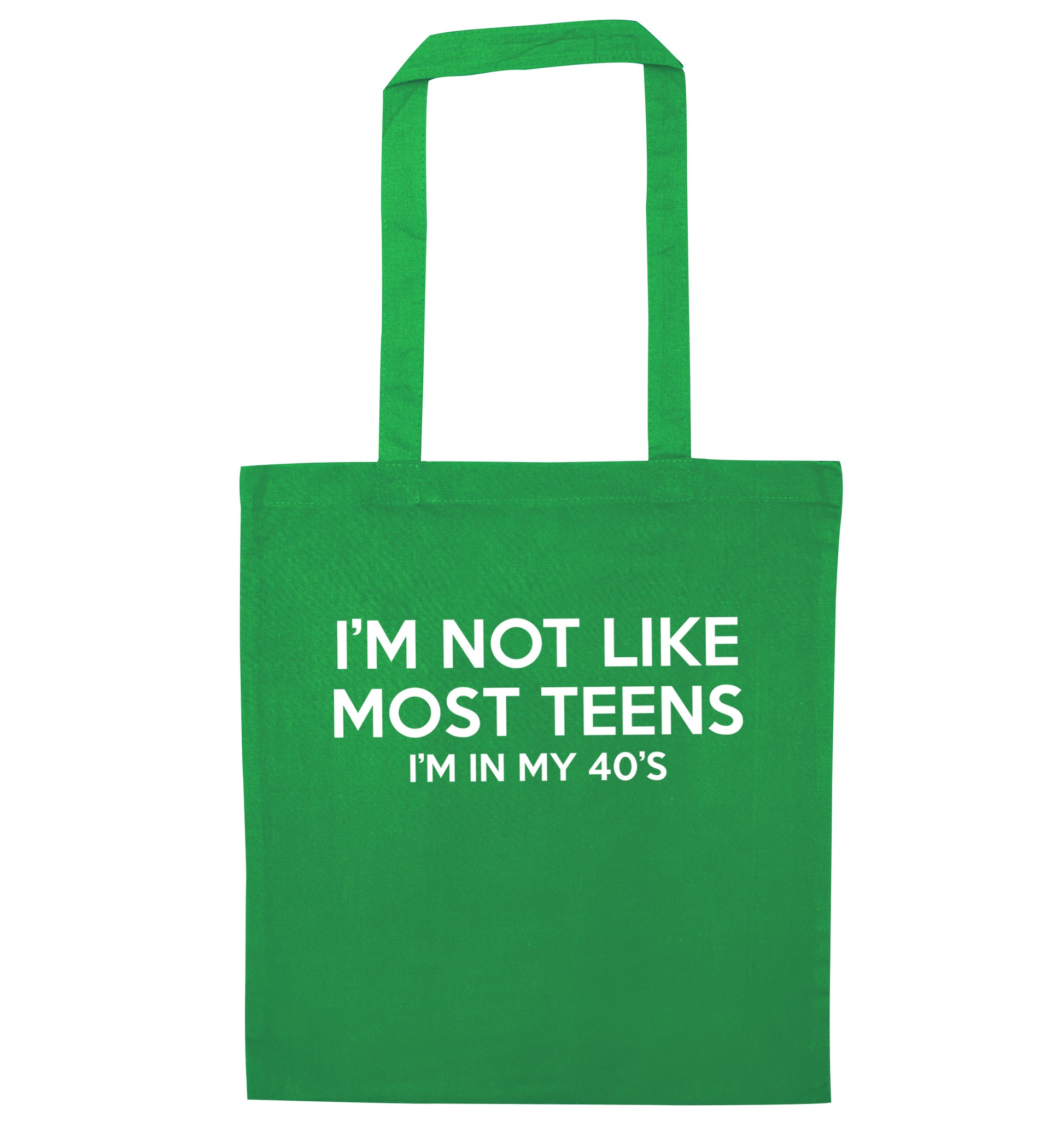 I'm not like most teens (I'm in my 40's) green tote bag