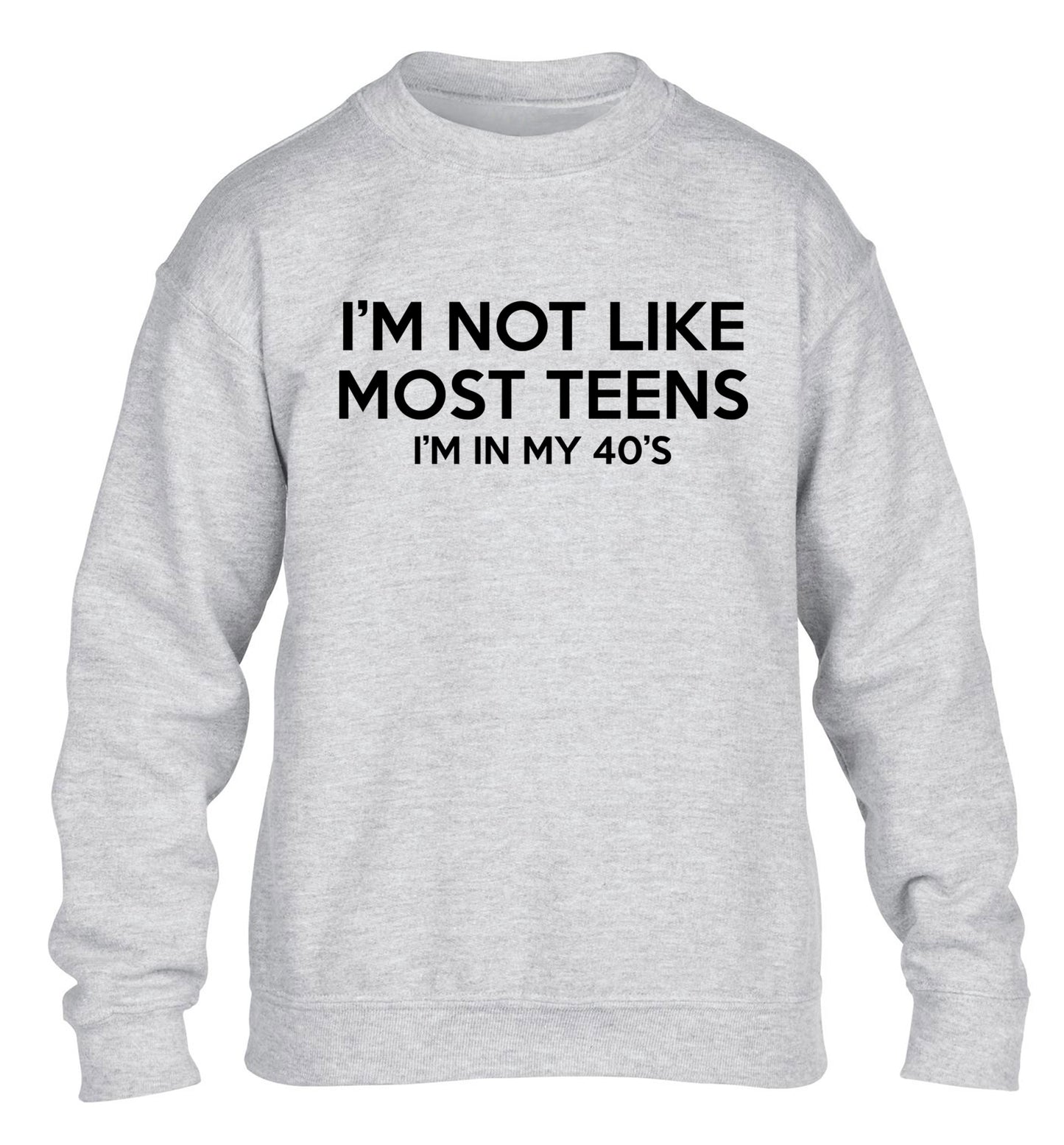 I'm not like most teens (I'm in my 40's) children's grey sweater 12-13 Years