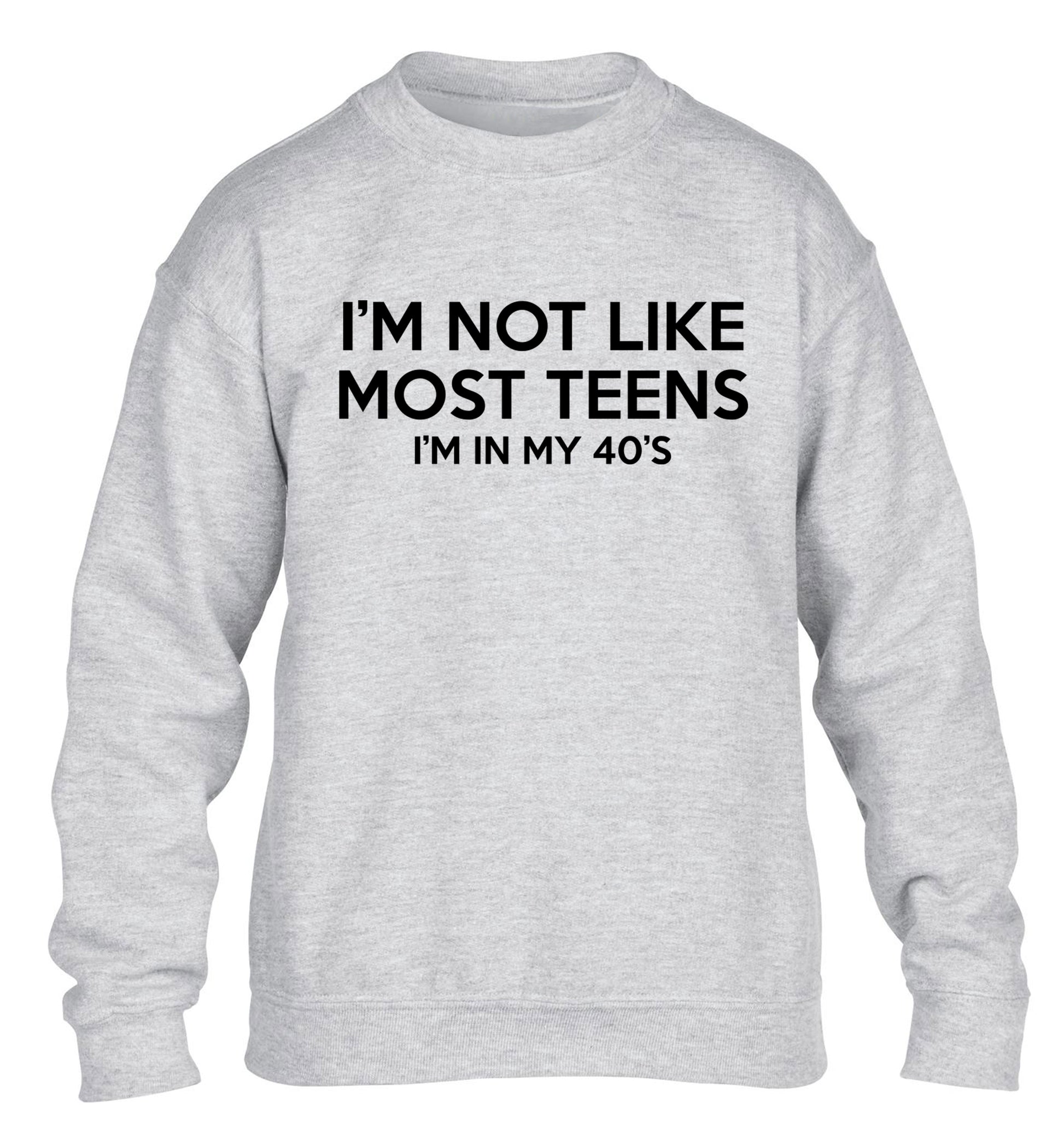 I'm not like most teens (I'm in my 40's) children's grey sweater 12-13 Years