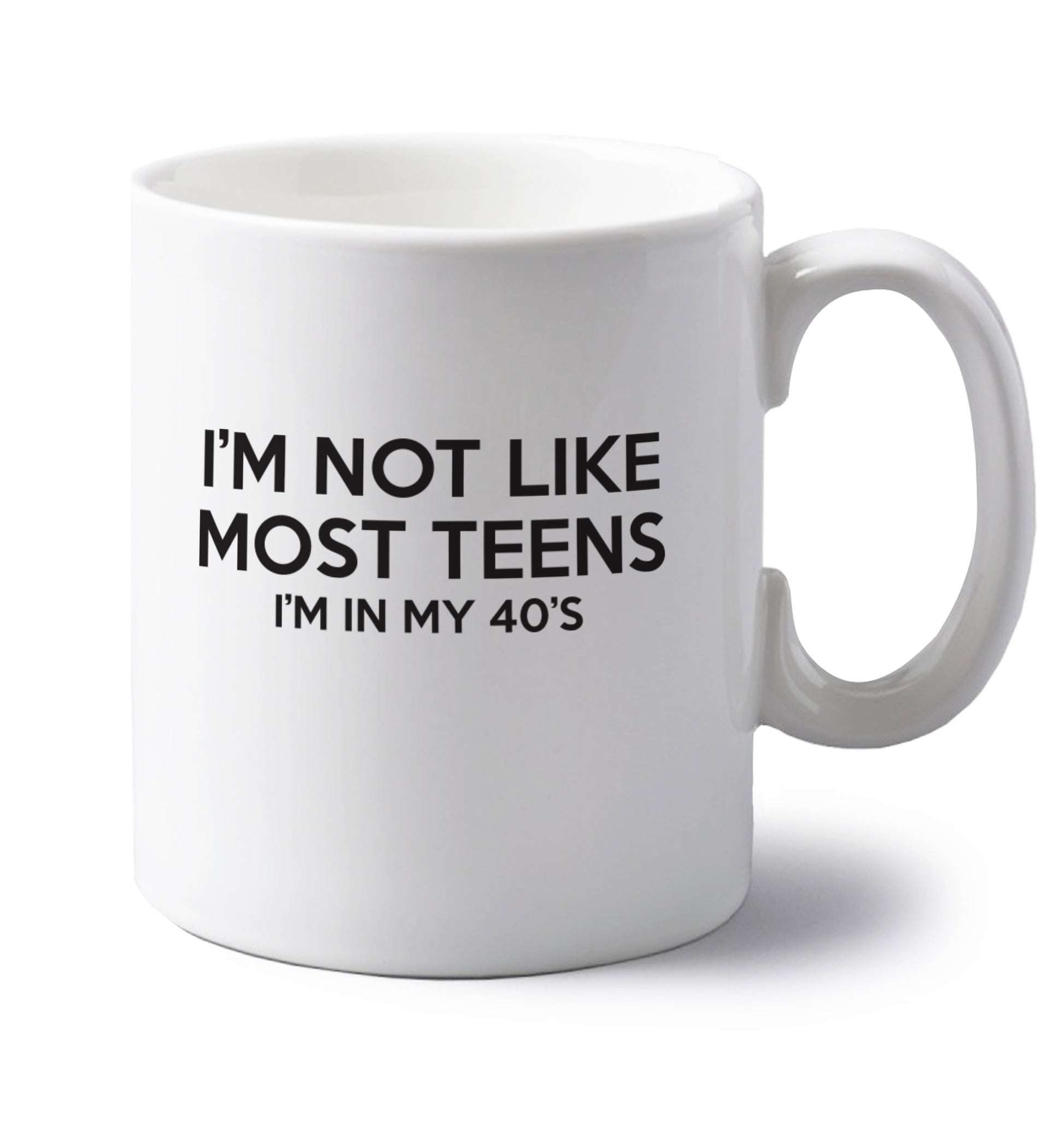 I'm not like most teens (I'm in my 40's) left handed white ceramic mug