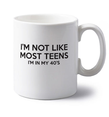 I'm not like most teens (I'm in my 40's) left handed white ceramic mug