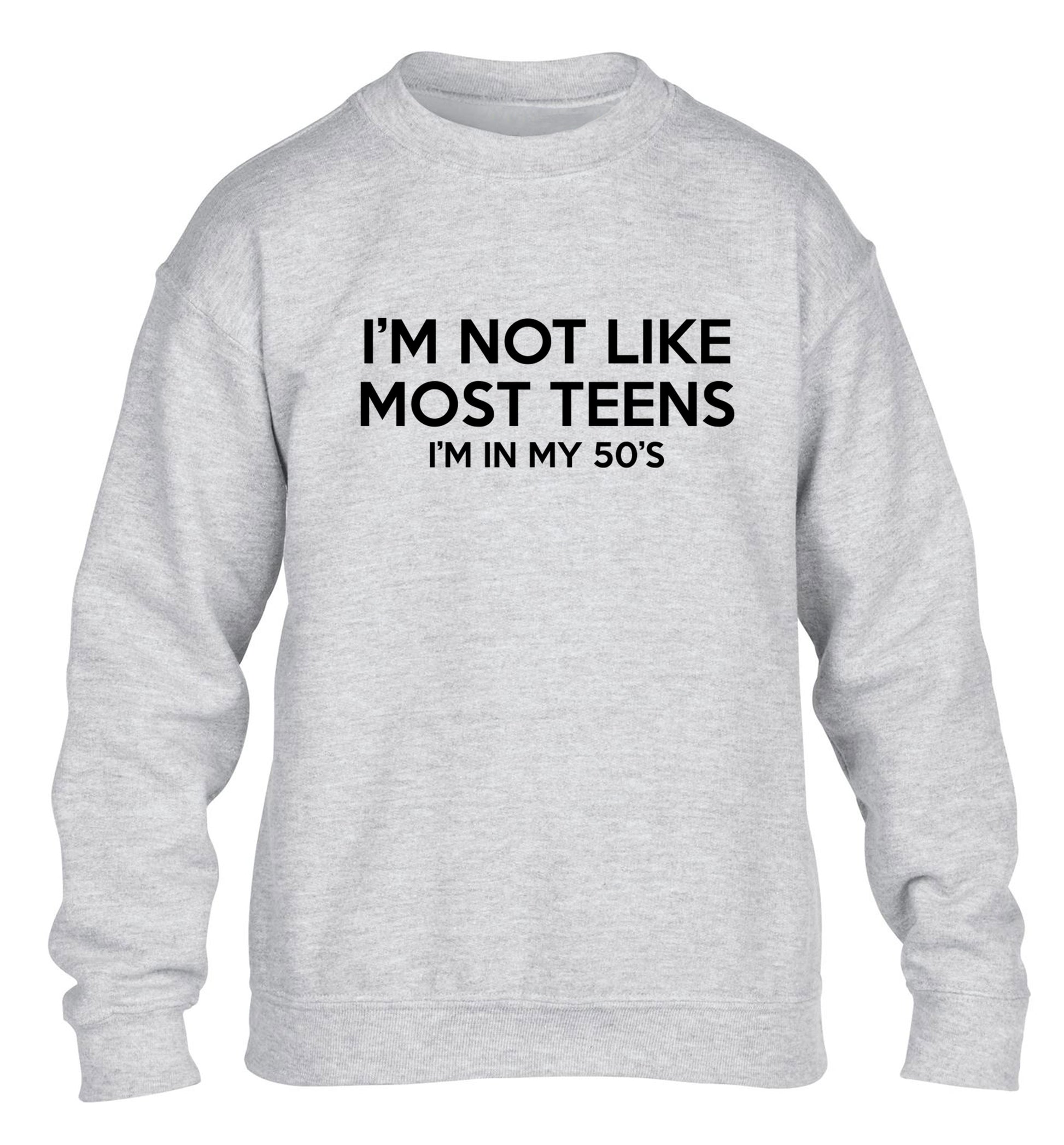 I'm not like most teens (I'm in my 50's) children's grey sweater 12-13 Years