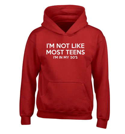 I'm not like most teens (I'm in my 50's) children's red hoodie 12-13 Years