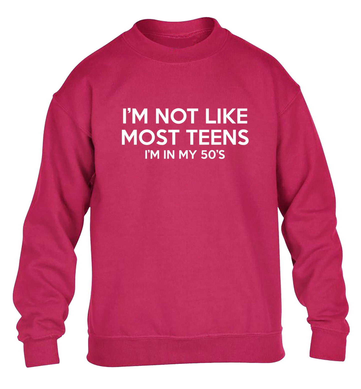 I'm not like most teens (I'm in my 50's) children's pink sweater 12-13 Years