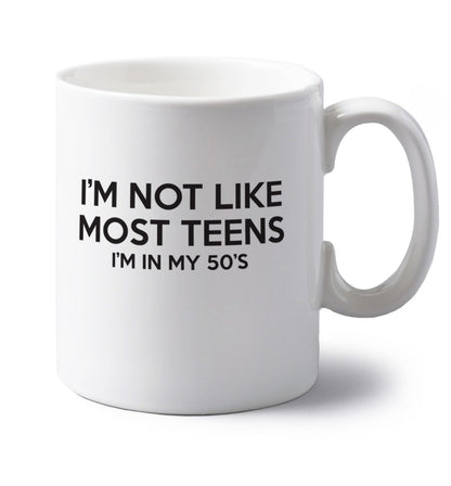 I'm not like most teens (I'm in my 50's) left handed white ceramic mug