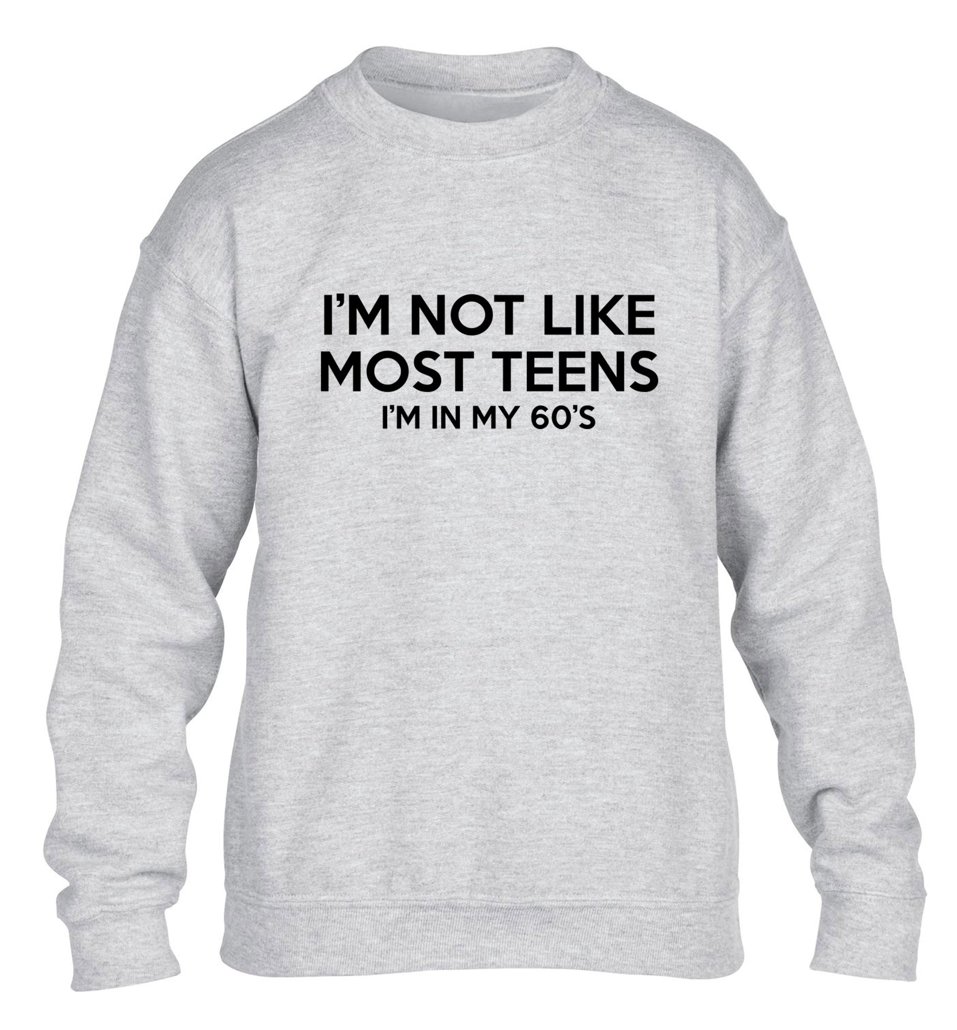 I'm not like most teens (I'm in my 60's) children's grey sweater 12-13 Years