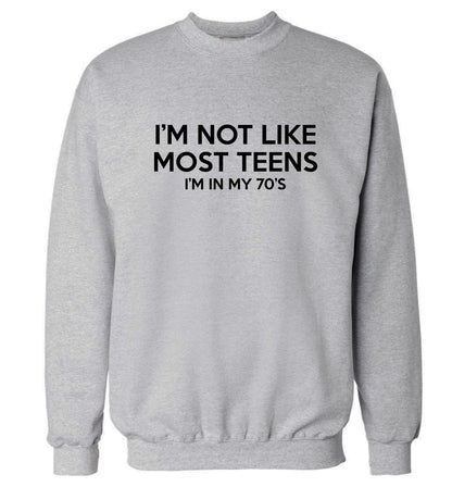 I'm not like most teens (I'm in my 70's) Adult's unisex grey Sweater 2XL