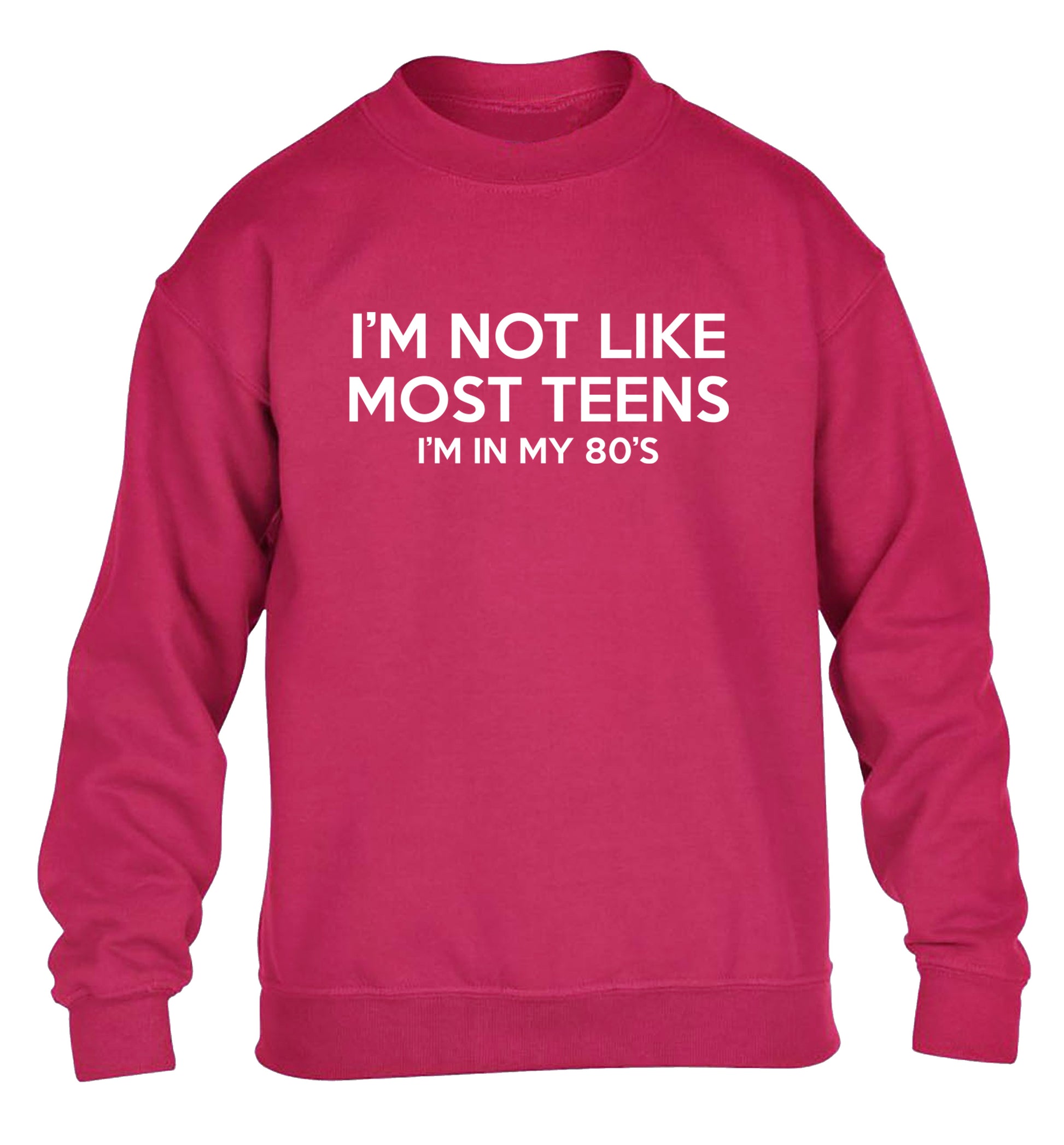 I'm not like most teens (I'm in my 80's) children's pink sweater 12-13 Years