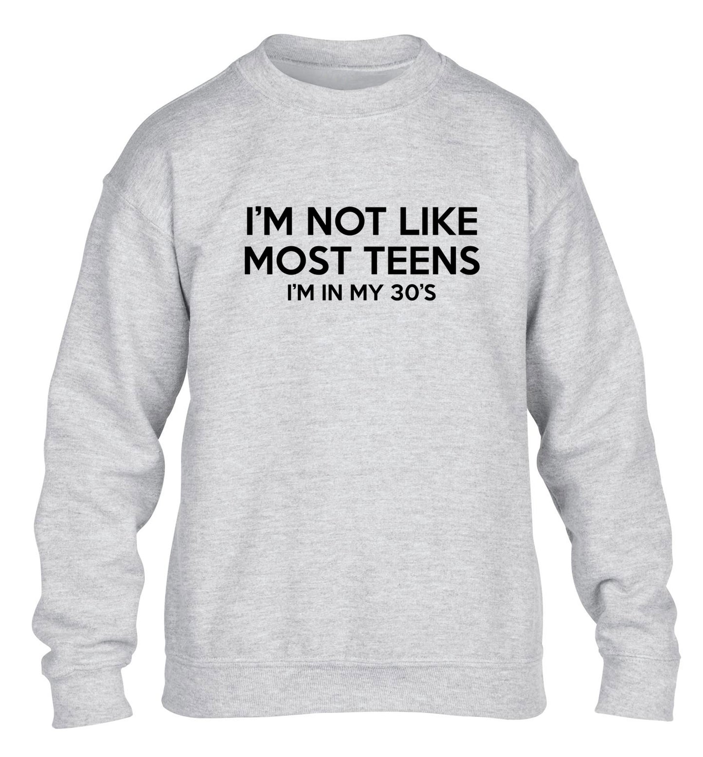 I'm not like most teens (I'm in my 30's) children's grey sweater 12-13 Years