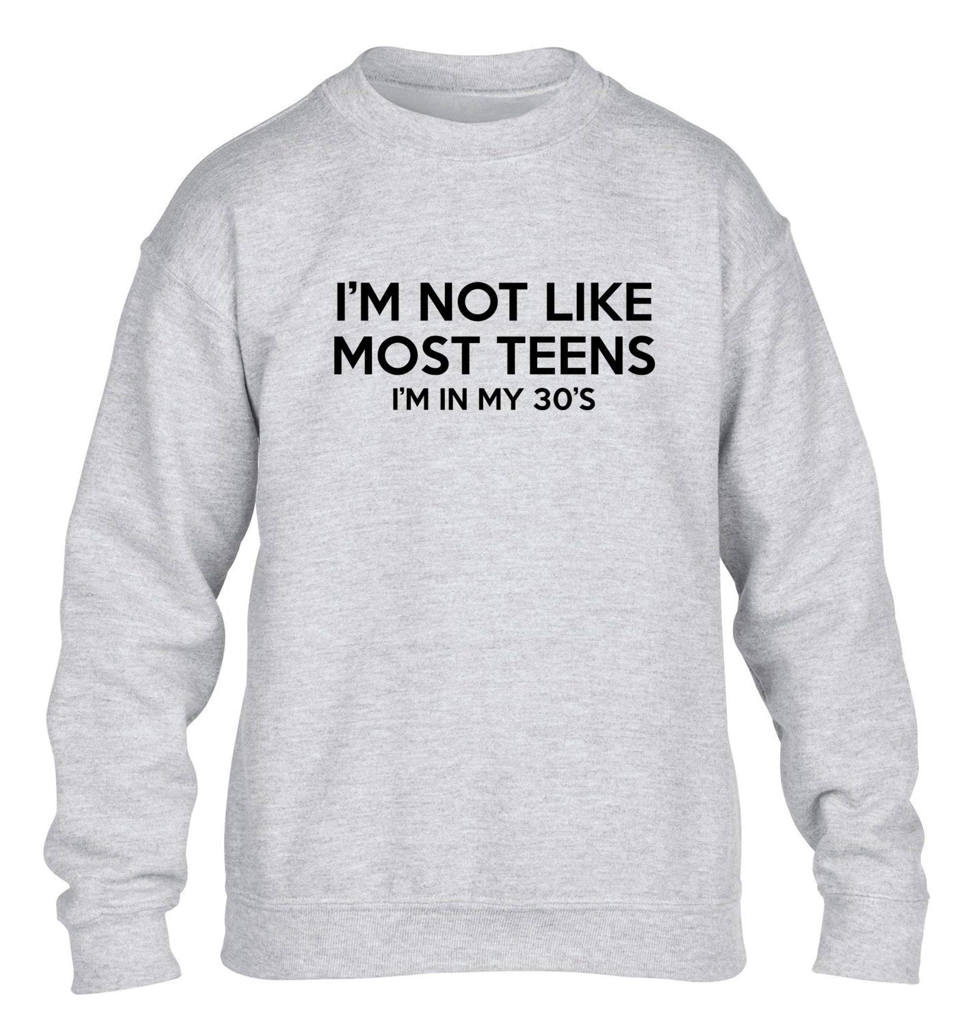 I'm not like most teens (I'm in my 30's) children's grey sweater 12-13 Years