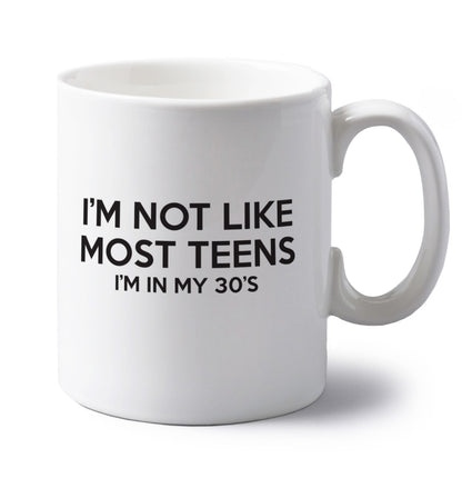 I'm not like most teens (I'm in my 30's) left handed white ceramic mug