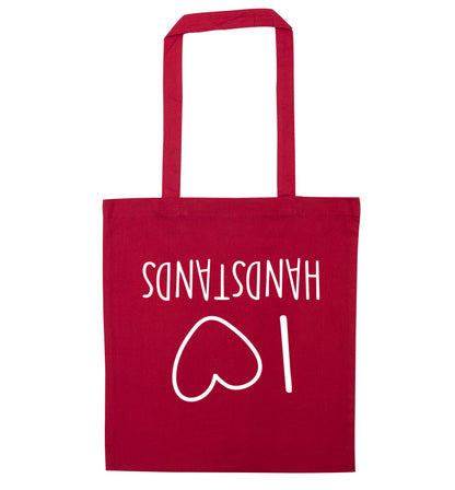 I love handstands red tote bag