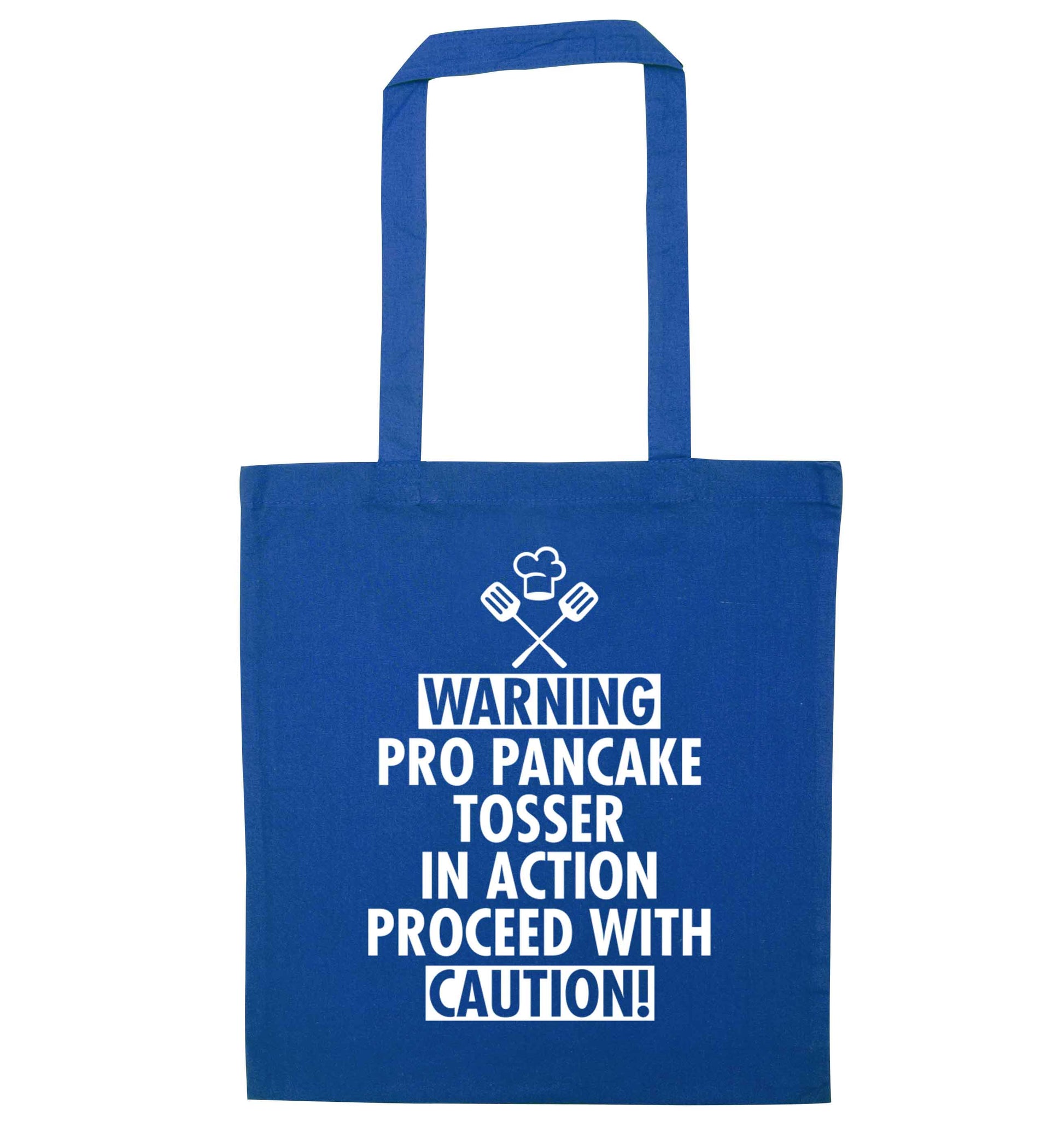 Warning pro pancake tosser in action proceed with caution blue tote bag