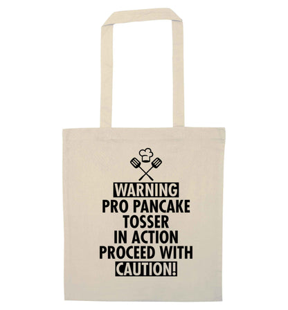 Warning pro pancake tosser in action proceed with caution natural tote bag