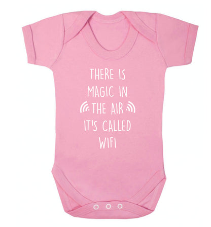 There is magic in the air it's called wifi Baby Vest pale pink 18-24 months