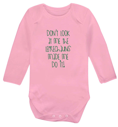 Don't look at me the leprechauns made me do it baby vest long sleeved pale pink 6-12 months