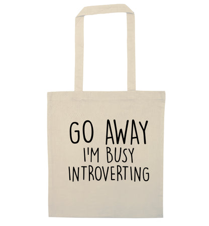 Go away I'm busy introverting natural tote bag