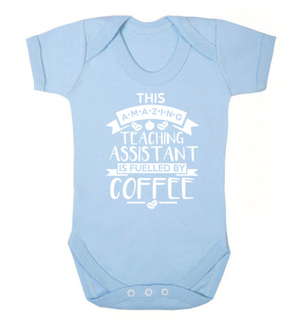 This amazing teaching assistant is fuelled by coffee Baby Vest pale blue 18-24 months