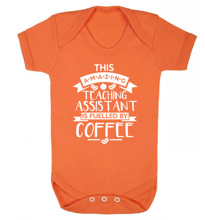 This amazing teaching assistant is fuelled by coffee Baby Vest orange 18-24 months