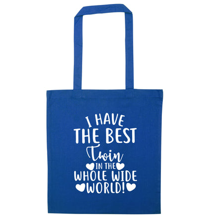 I have the best twin in the whole wide world! blue tote bag