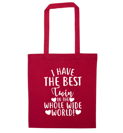 I have the best twin in the whole wide world! red tote bag