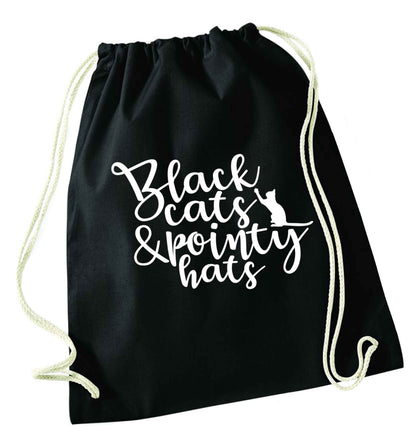 Black cats and pointy hats black drawstring bag