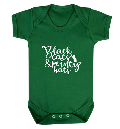 Black cats and pointy hats baby vest green 18-24 months