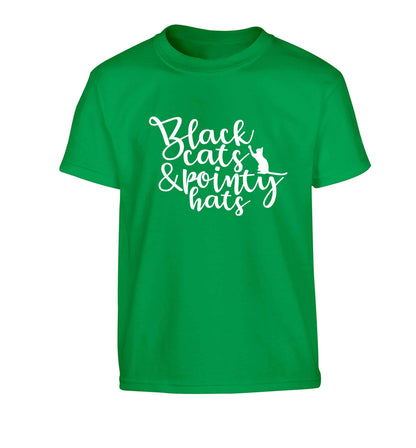 Black cats and pointy hats Children's green Tshirt 12-13 Years