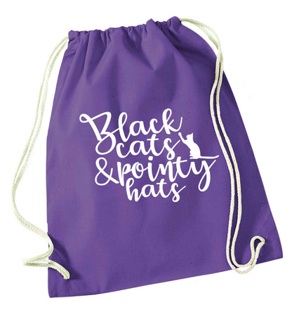 Black cats and pointy hats purple drawstring bag