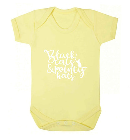Black cats and pointy hats baby vest pale yellow 18-24 months