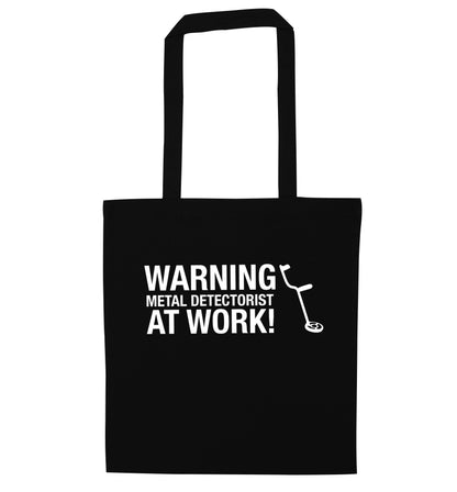 Warning metal detectorist at work! black tote bag